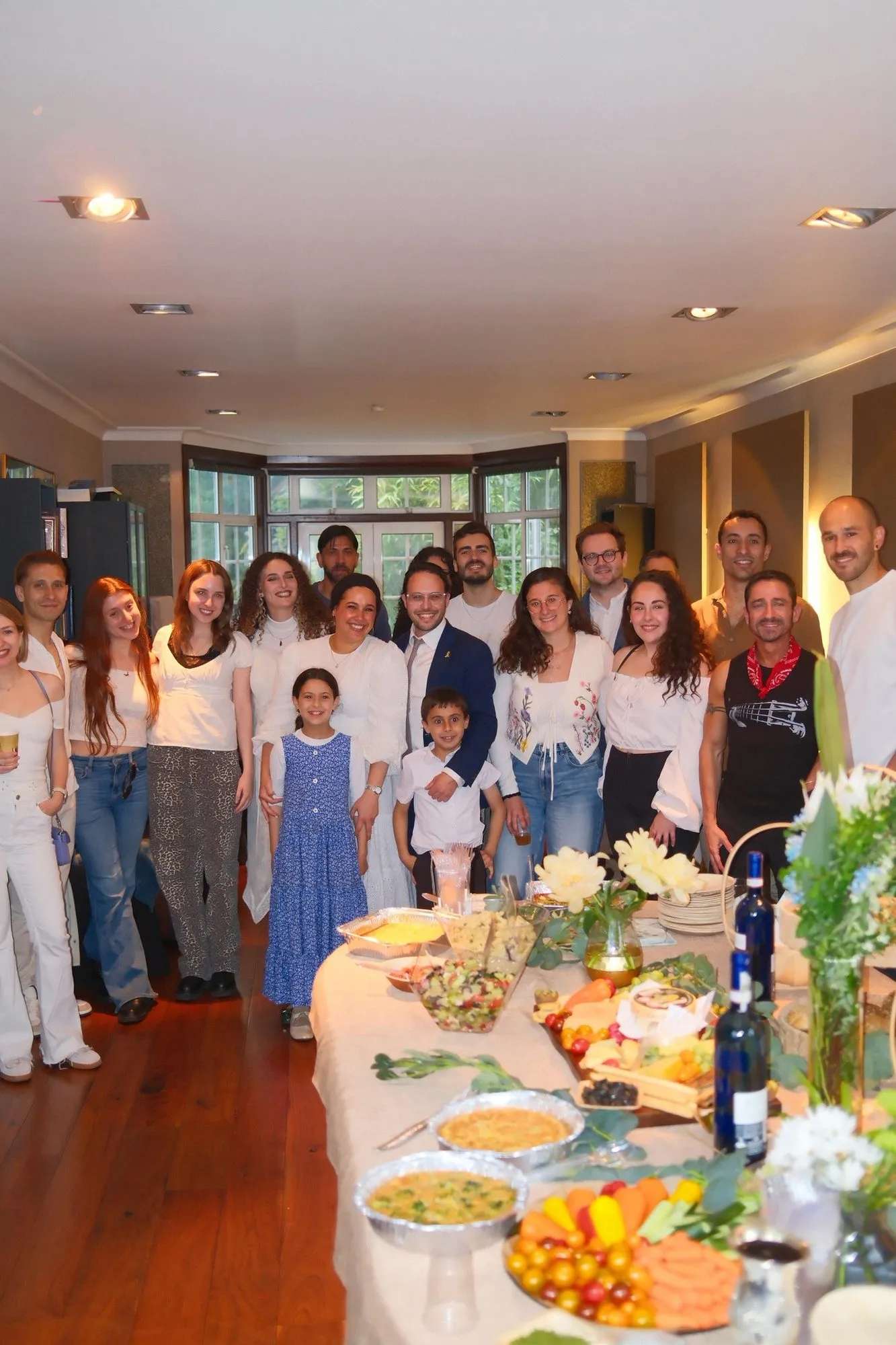 The HBayit community around a holiday table