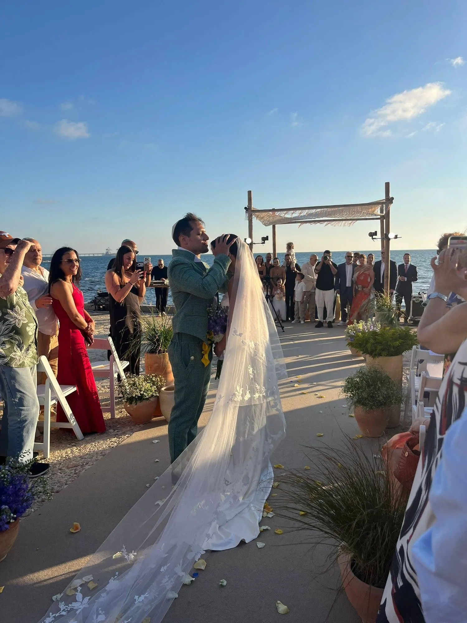 A community wedding by the sea